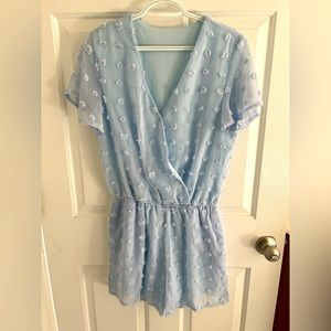 Light blue size small romper with pockets